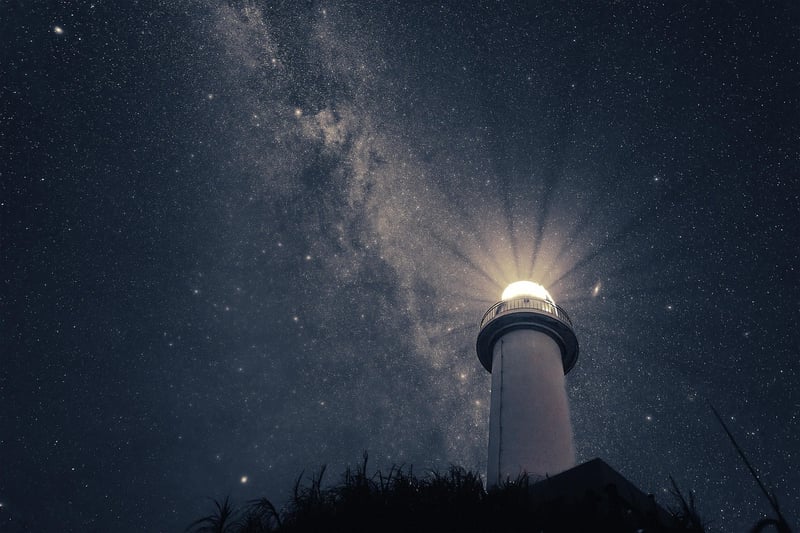 Person walking under the stars