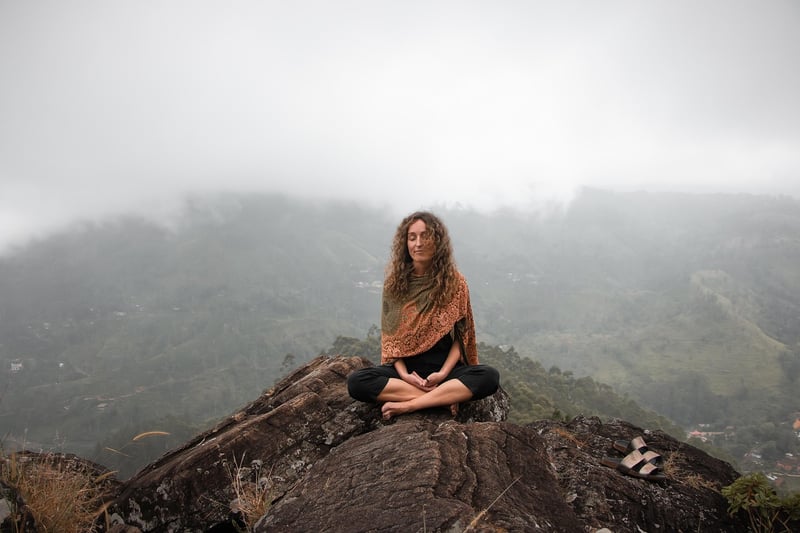 Woman practicing restorative yoga